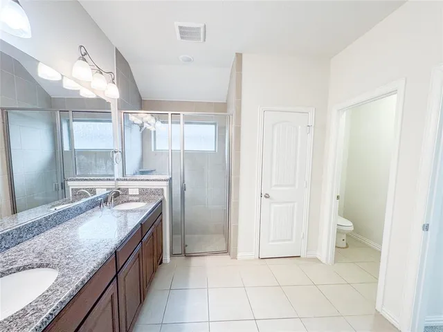 a view of a roof deck with wooden fence