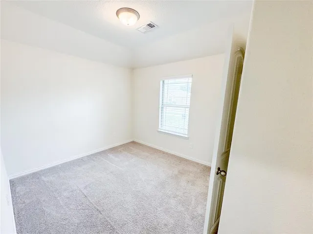 an empty room with closet