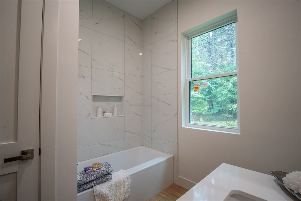 20 Merrifield Road North Bernardston, MA 01337 - Photo 25 of 41 a bath room with a bed and a window