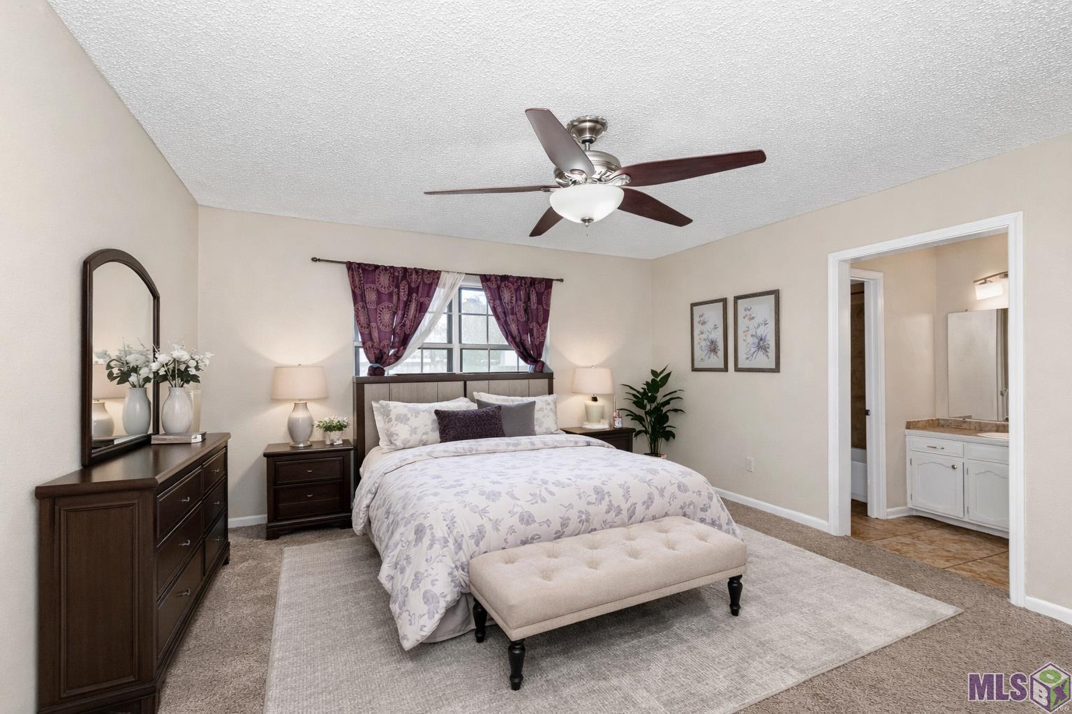 11017 Del Cano Avenue Baton Rouge, LA 70816 - Photo 14 of 25 Staged Master Bedroom