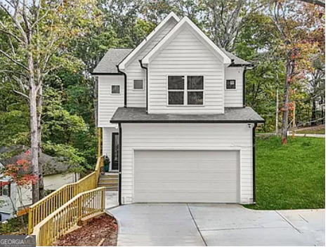 3925 Pineshore Circle Gainesville, GA 30501 - Photo 1 of 18 a front view of a house with a garden
