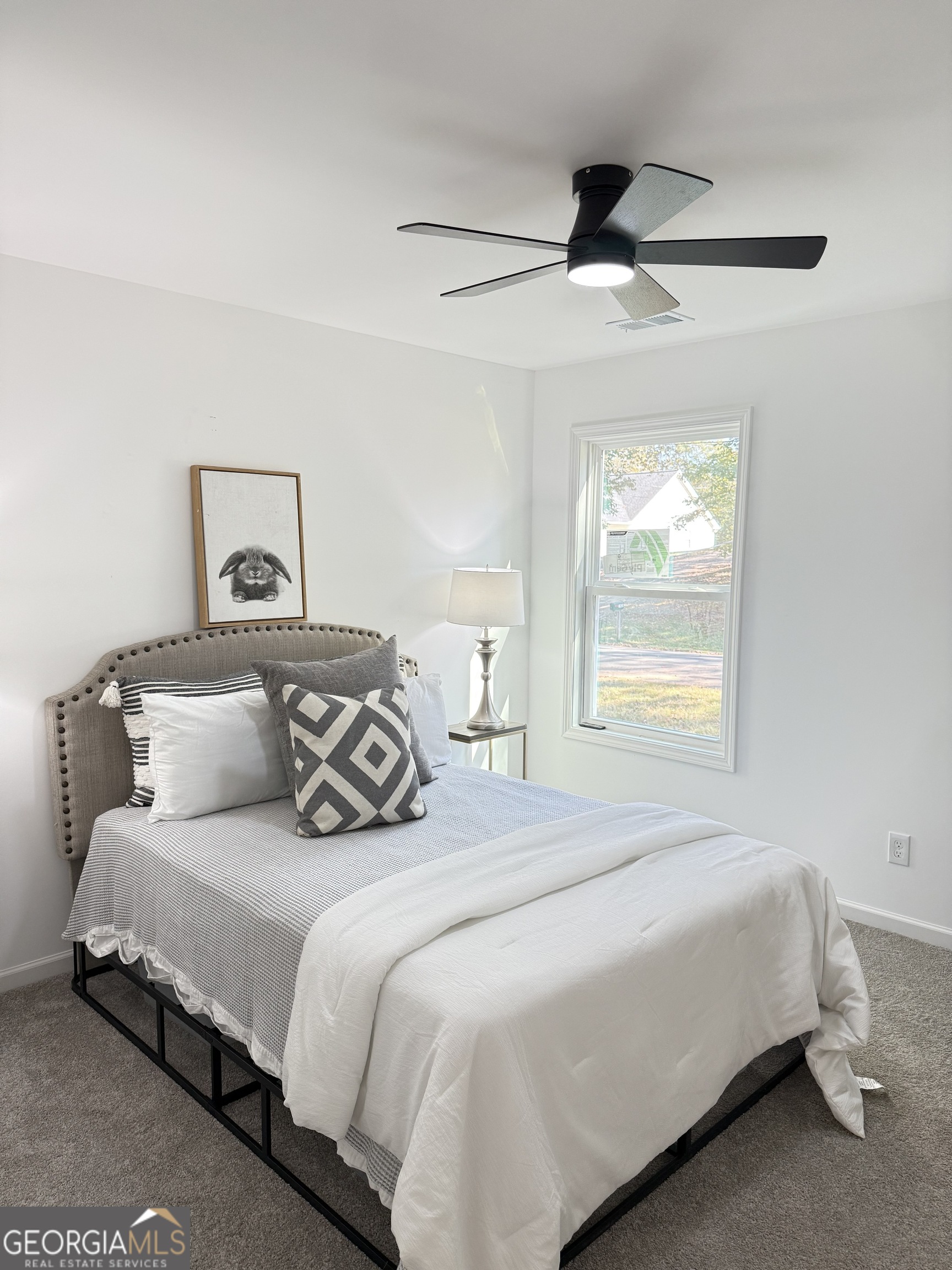 3925 Pineshore Circle Gainesville, GA 30501 - Photo 15 of 18 a bedroom with a bed and a window