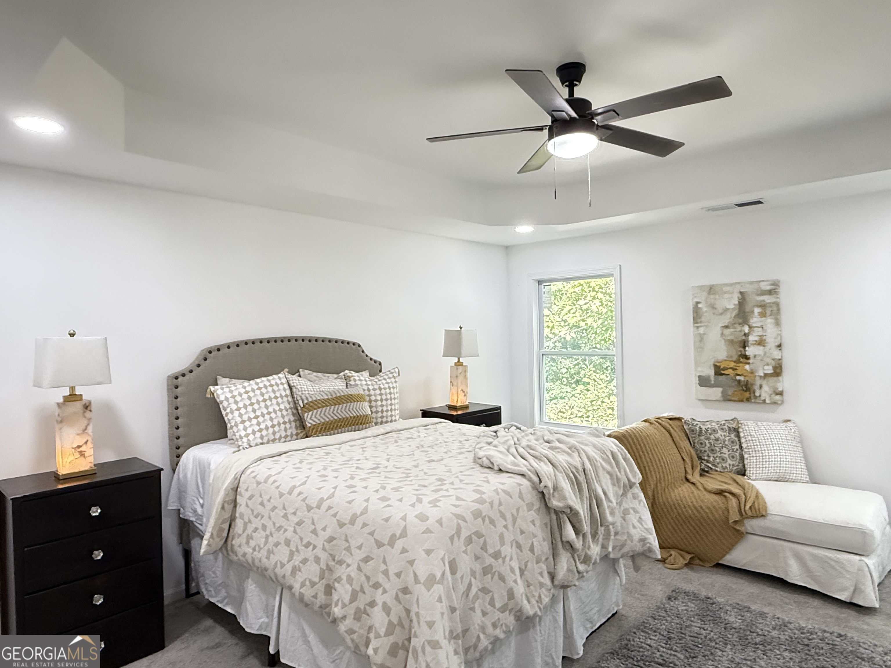 3925 Pineshore Circle Gainesville, GA 30501 - Photo 16 of 18 a bedroom with a bed a window and a couch