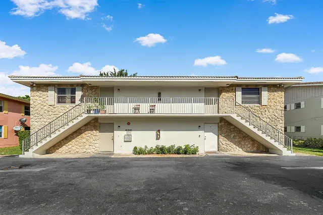 a view of a house with a street