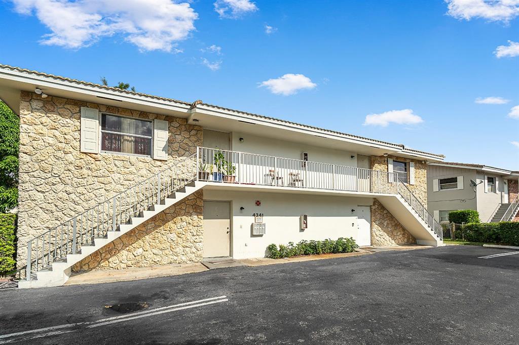 4341 Riverside Drive, Unit D Coral Springs, FL 33065 - Photo 2 of 3 a view of a large building