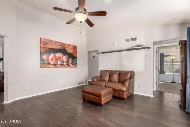 a living room with furniture and a window