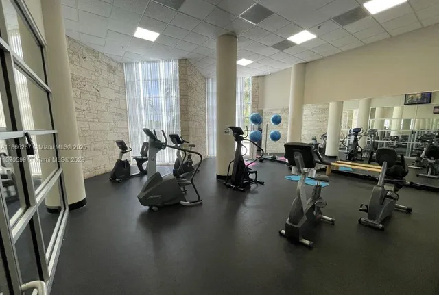 a view of a room with gym equipment