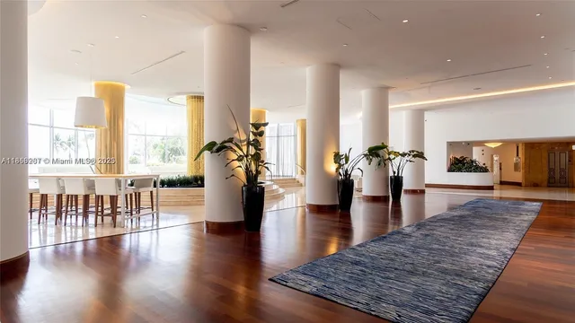 a kitchen with a table and chairs in it