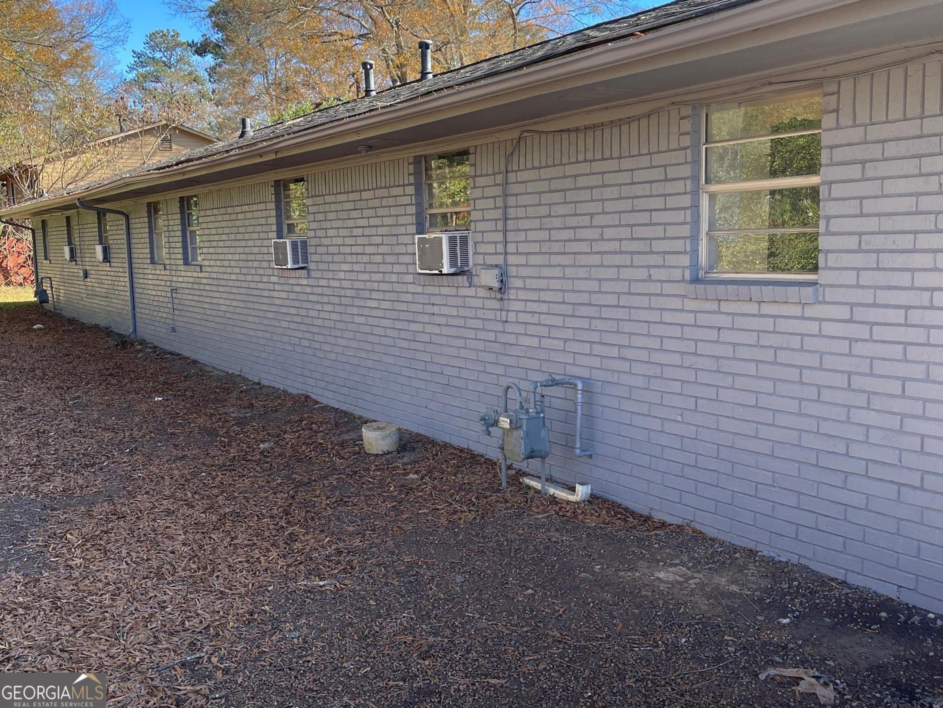 160 Spring Street, Unit B Jonesboro, GA 30236 - Photo 2 of 14 a view of a backyard