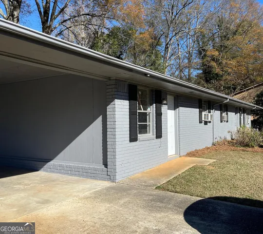 a view of a house with a garage