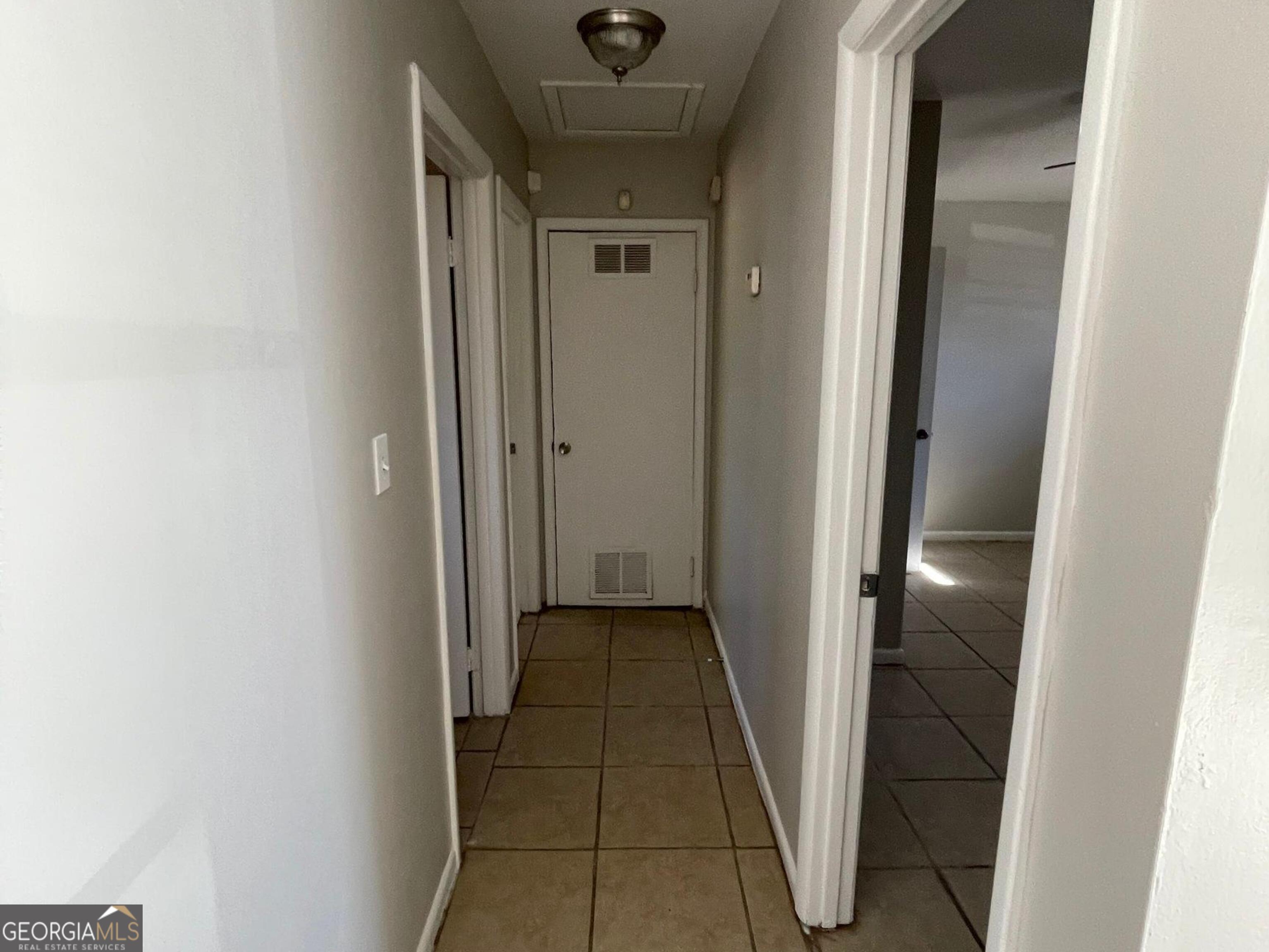 160 Spring Street, Unit B Jonesboro, GA 30236 - Photo 10 of 14 a view of a hallway