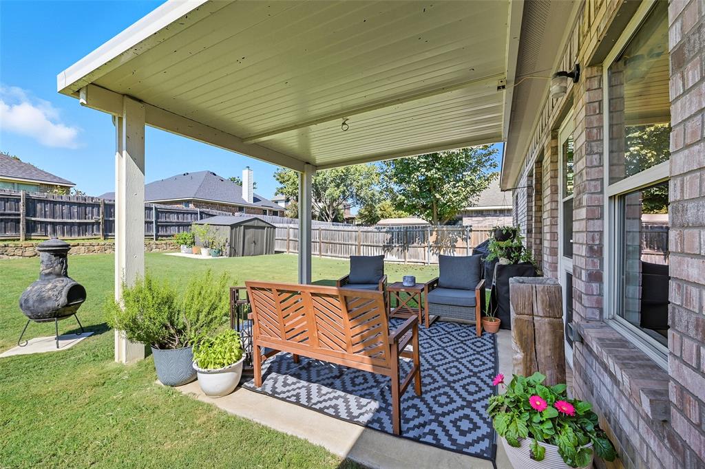 308 Sheridan Road Oak Point, TX 75068 - Photo 16 of 20 a view of an outdoor sitting area