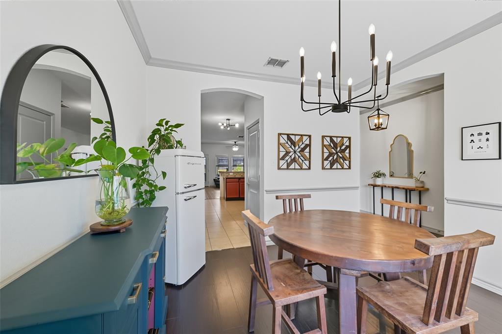 308 Sheridan Road Oak Point, TX 75068 - Photo 5 of 20 a view of a dining room with furniture and wooden floor