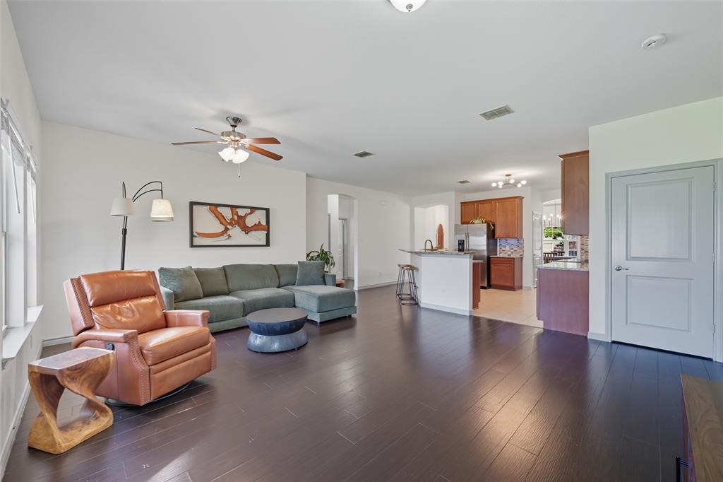 308 Sheridan Road Oak Point, TX 75068 - Photo 6 of 20 a living room with furniture and kitchen view