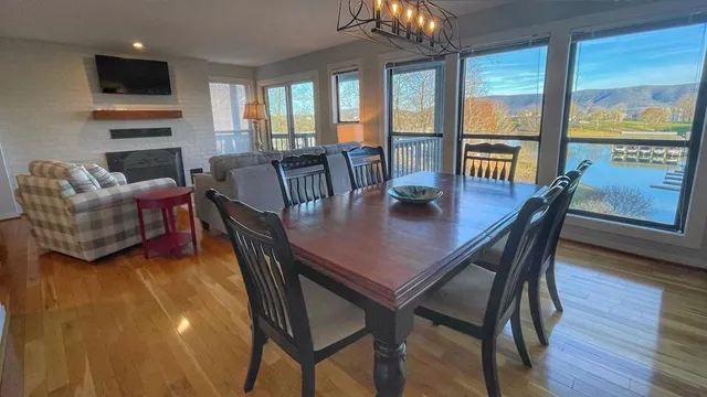 a view of a dining room with furniture window and outside view