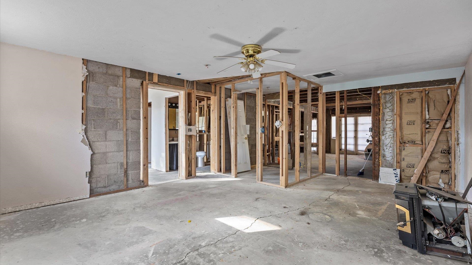 1055 Glenwood Drive Grand Junction, CO 81503 - Photo 17 of 27 a view of an empty room with a window