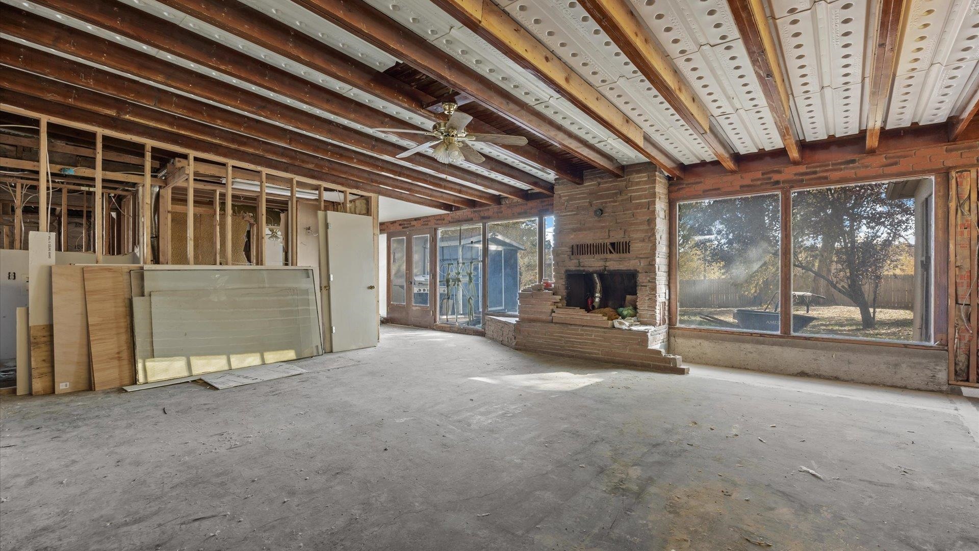 1055 Glenwood Drive Grand Junction, CO 81503 - Photo 20 of 27 a view of a livingroom with fireplace and window