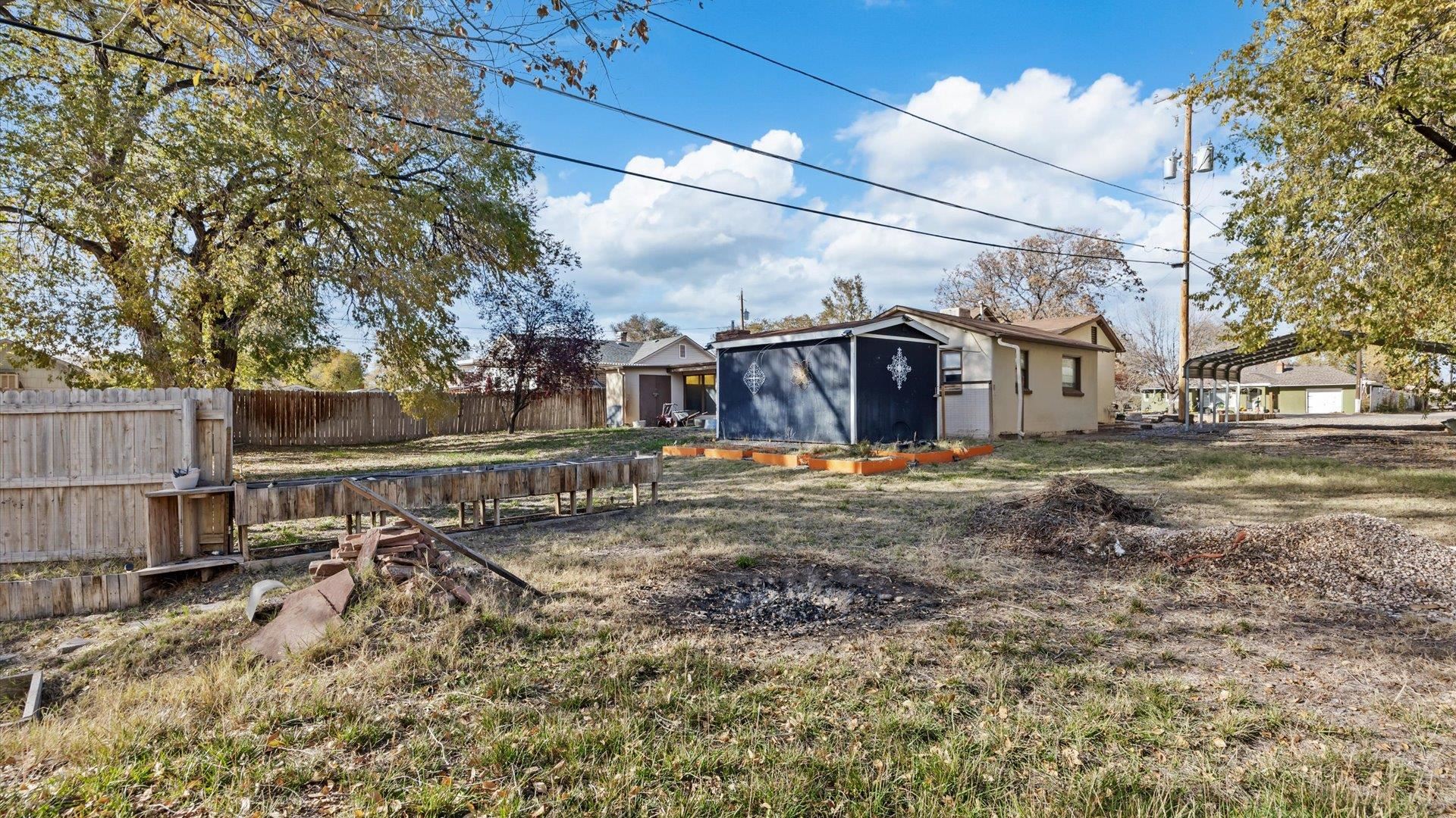 1055 Glenwood Drive Grand Junction, CO 81503 - Photo 22 of 27 a view of a house with a yard