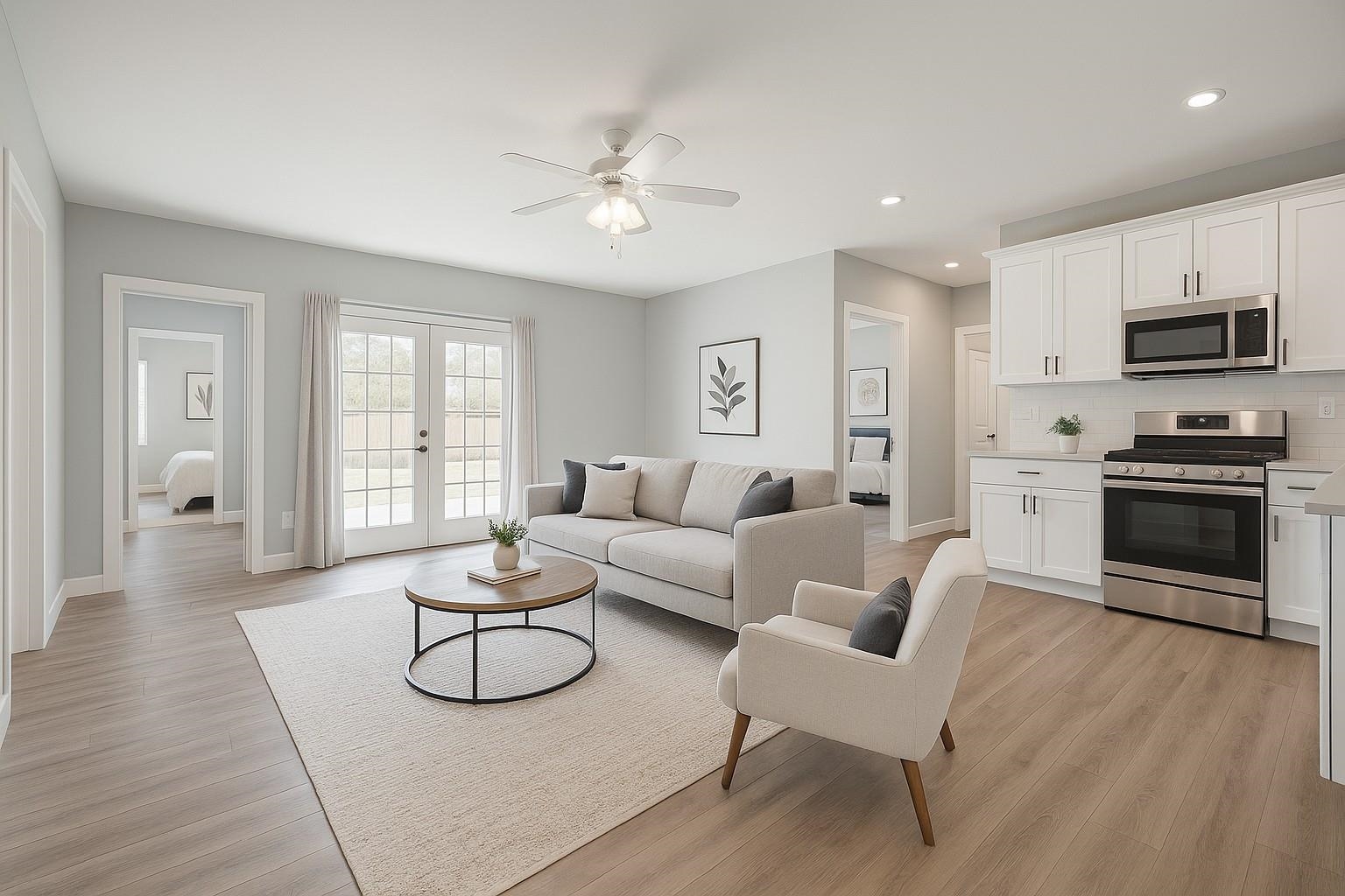 1055 Glenwood Drive Grand Junction, CO 81503 - Photo 25 of 27 a living room with furniture and a wooden floor