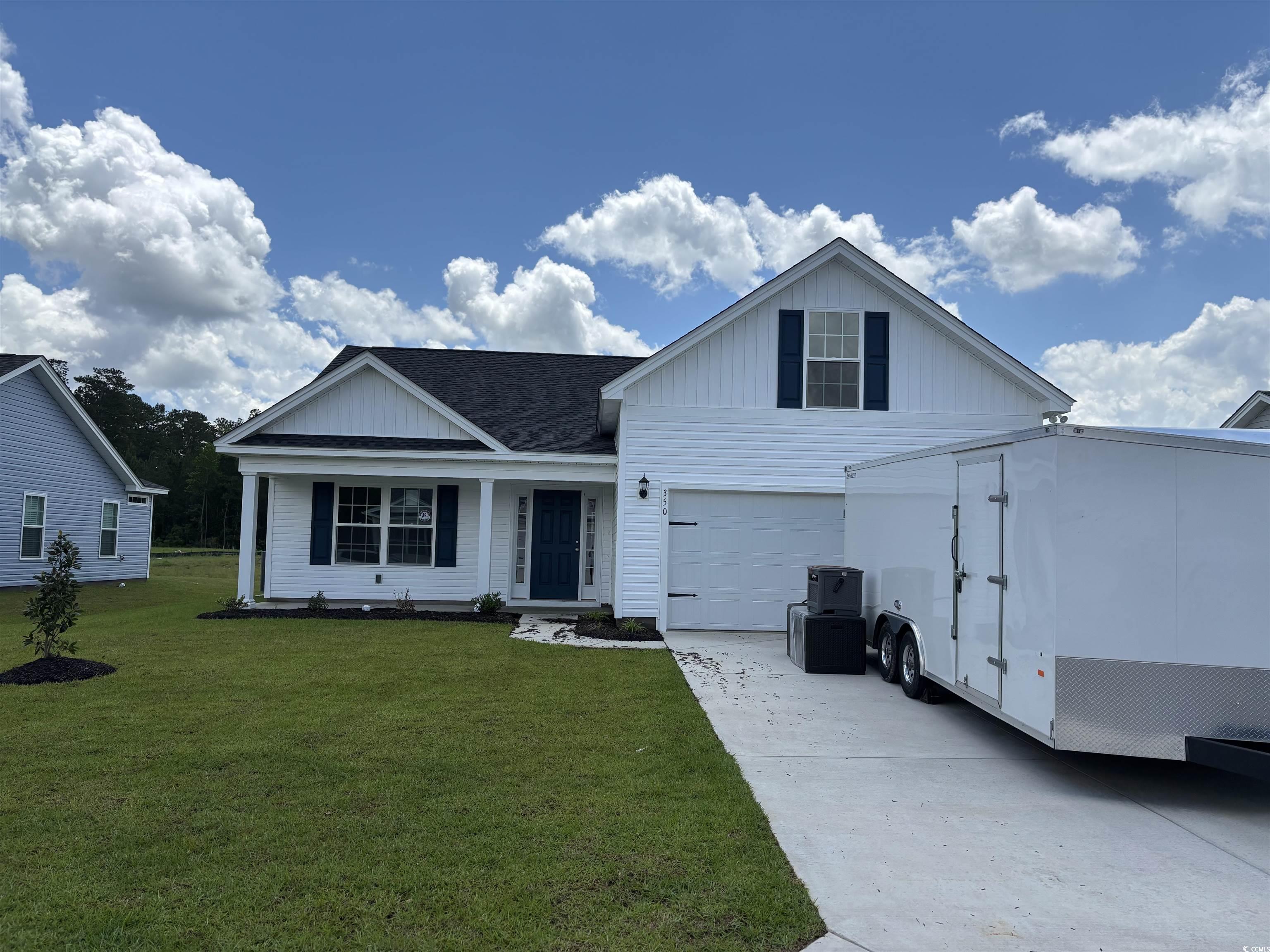 350 Barn Owl Way Conway, SC 29527 - Photo 1 of 20 View of front of house with concrete driveway, boa
