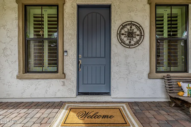 a view of a livingroom with furniture window and wooden floor