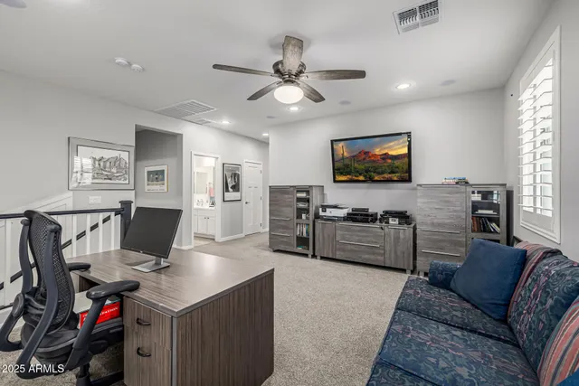 a bathroom with a toilet a sink and a mirror