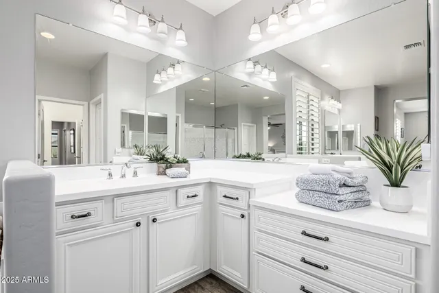 a view of a garden with a building in the background