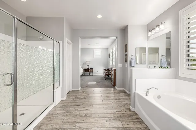 a front view of a house with yard and green space