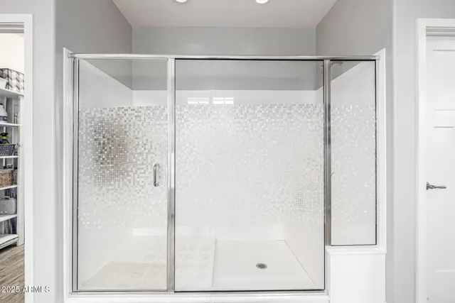 a building outdoor space with patio furniture and potted plants