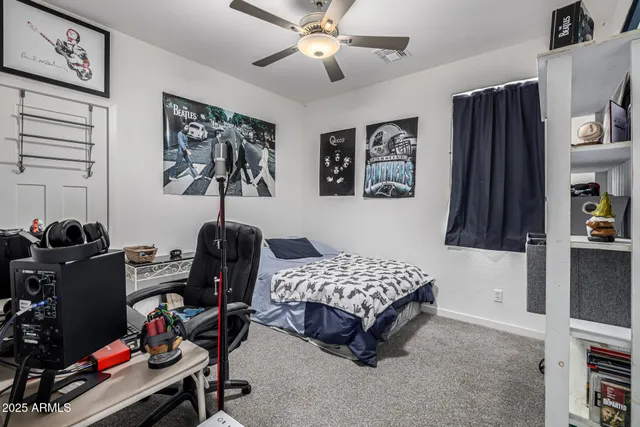 a view of a patio with couches table and chairs and potted plants