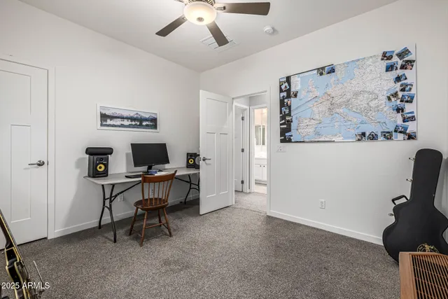 a view of a chairs and table in the patio