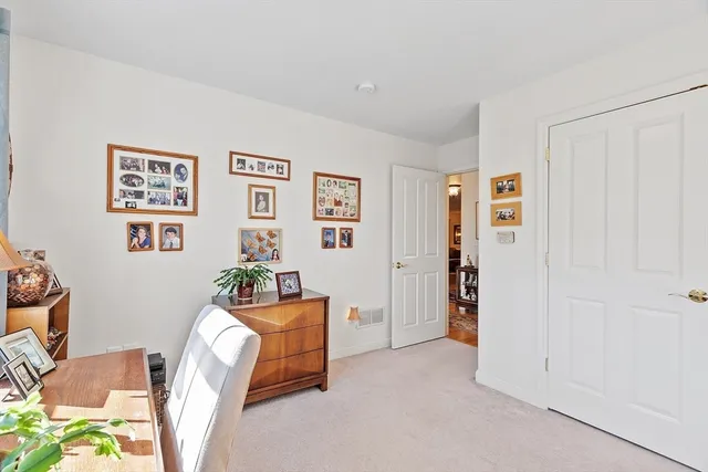 a bedroom with furniture and a bed