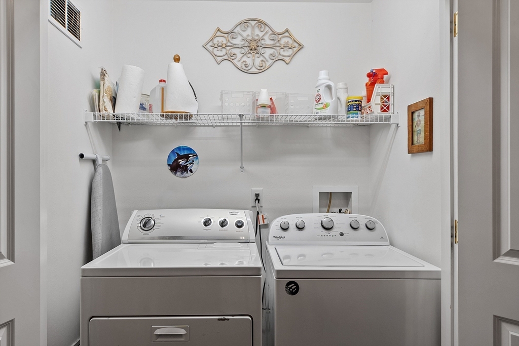27 Russell Farm Drive, Unit 27 Methuen, MA 01844 - Photo 25 of 39 a utility room with dryer and washer