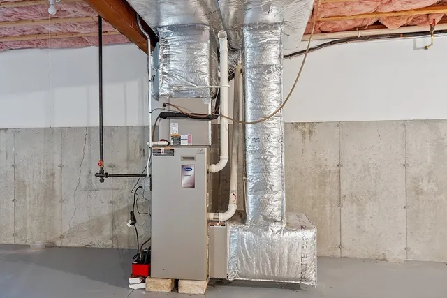 a bathroom with a shower and a sink