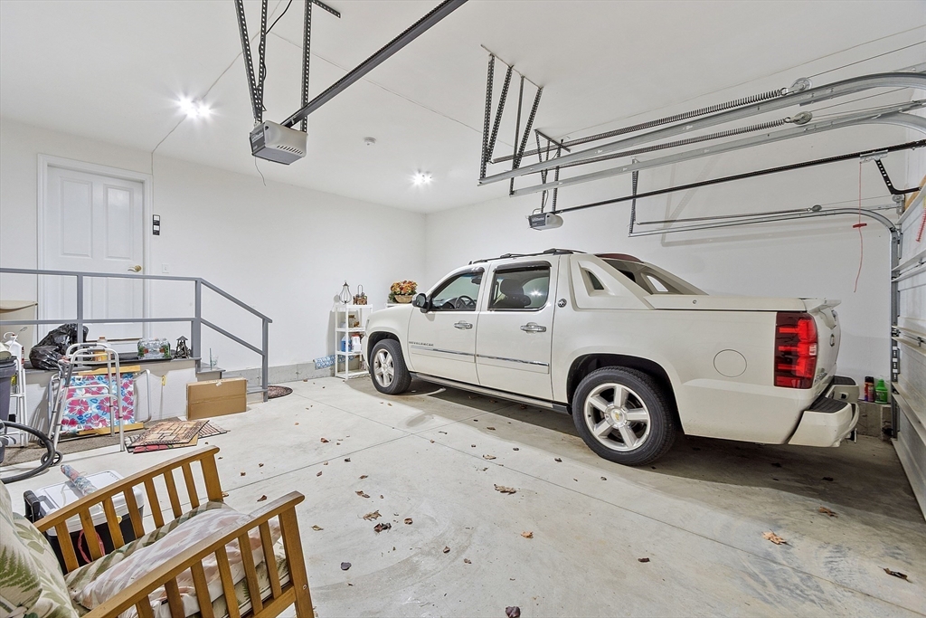 27 Russell Farm Drive, Unit 27 Methuen, MA 01844 - Photo 32 of 39 a view of a car garage