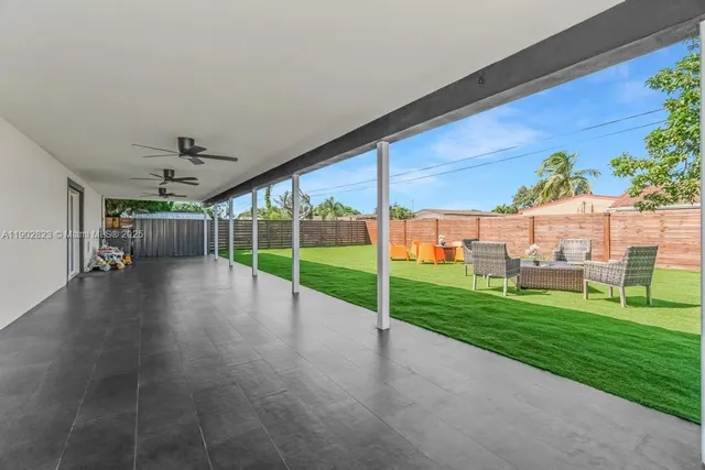 a view of a porch and garden