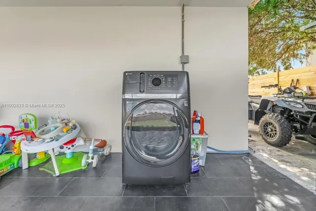 a utility room with toys and closet