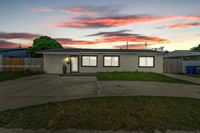front view of house with a yard