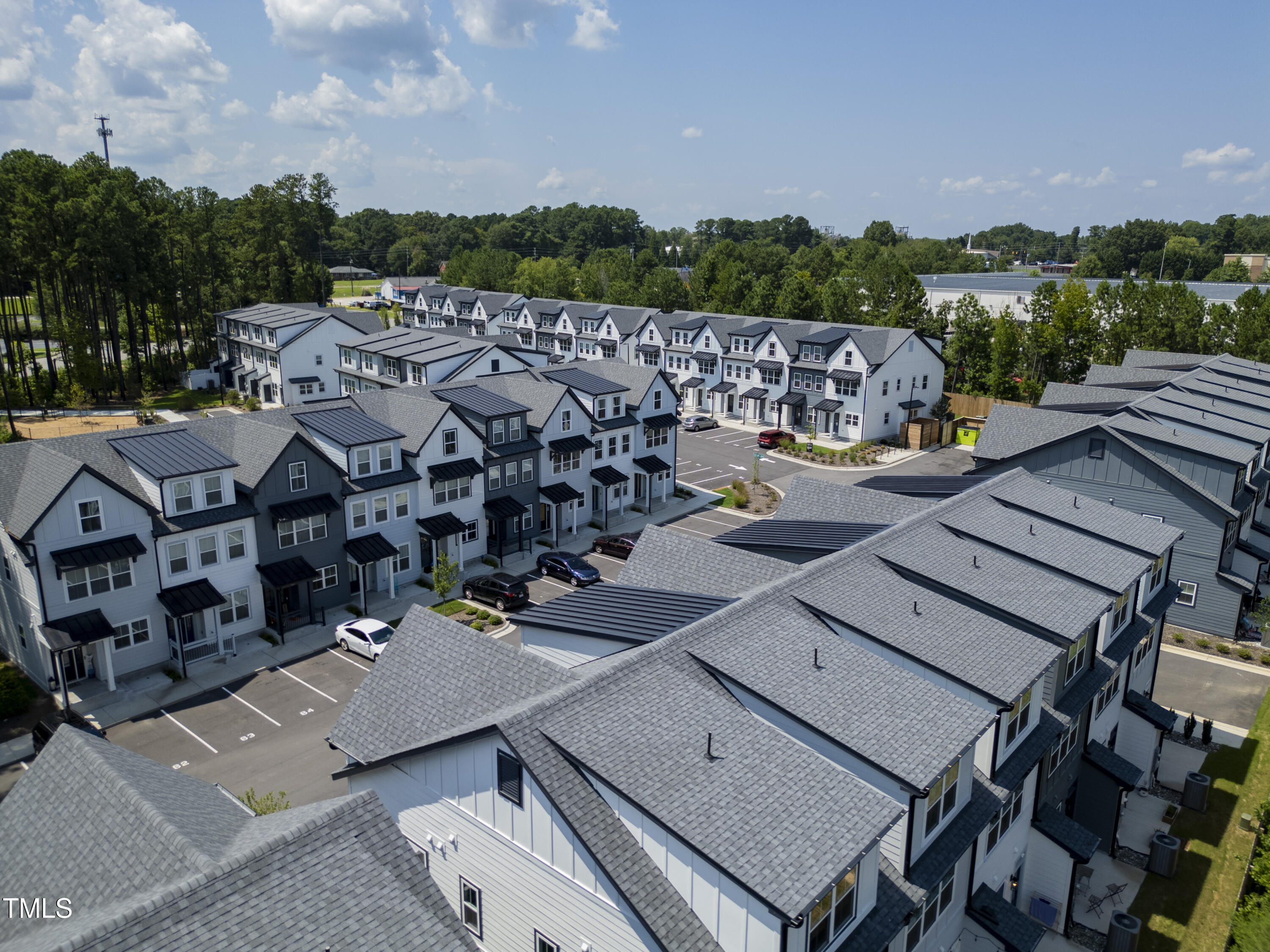 4820 Gossamer Lane, Unit 104 Raleigh, NC 27616 - Photo 2 of 45 an aerial view of a house with a garden