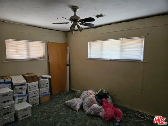 a room with toys and wooden floor