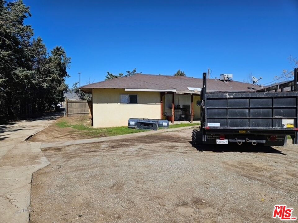 1300 West Valley Boulevard Tehachapi, CA 93561 - Photo 7 of 14 a view of a house with a yard
