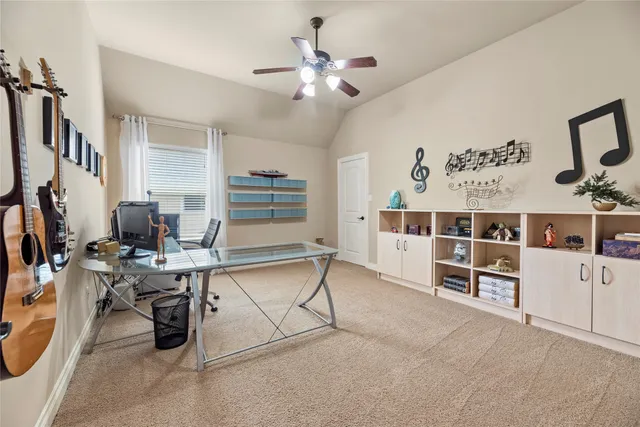 a bedroom with a bed a chair and a chandelier