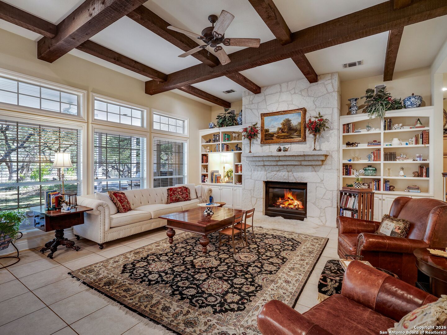 155 Cibolo Ridge Trail Boerne, TX 78015 - Photo 18 of 100 a living room with furniture large window and a fireplace