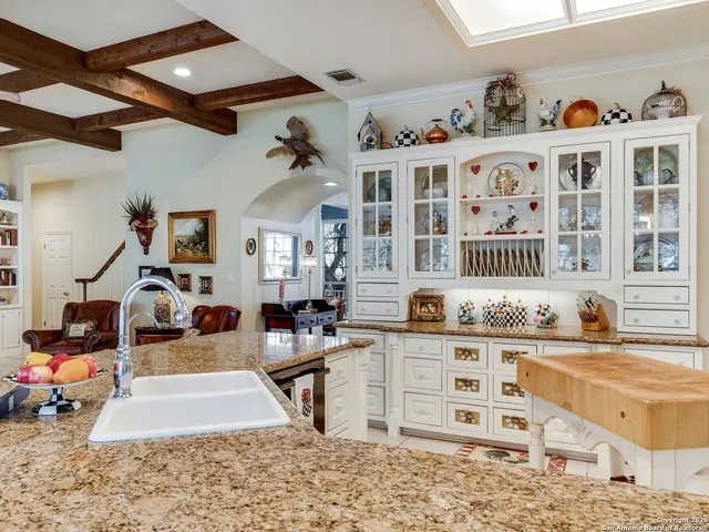 a bedroom with a bed furniture and a window