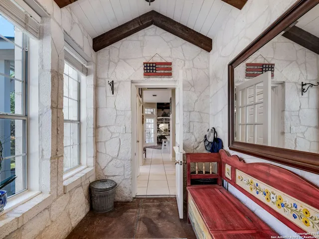a bedroom with a bed and a walk in closet