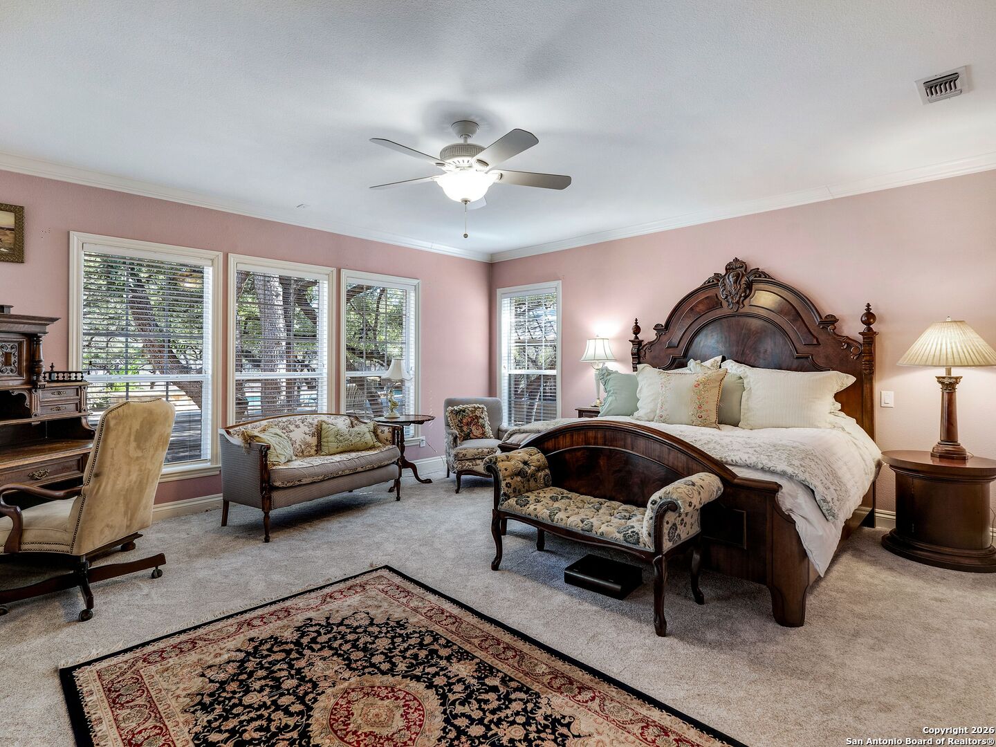 155 Cibolo Ridge Trail Boerne, TX 78015 - Photo 40 of 100 a bedroom with a bed a couch and a window