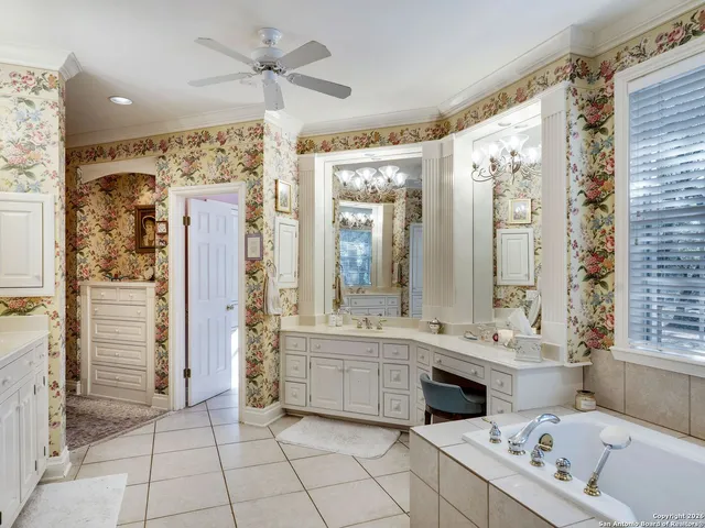 a view of patio with table and chairs and couches