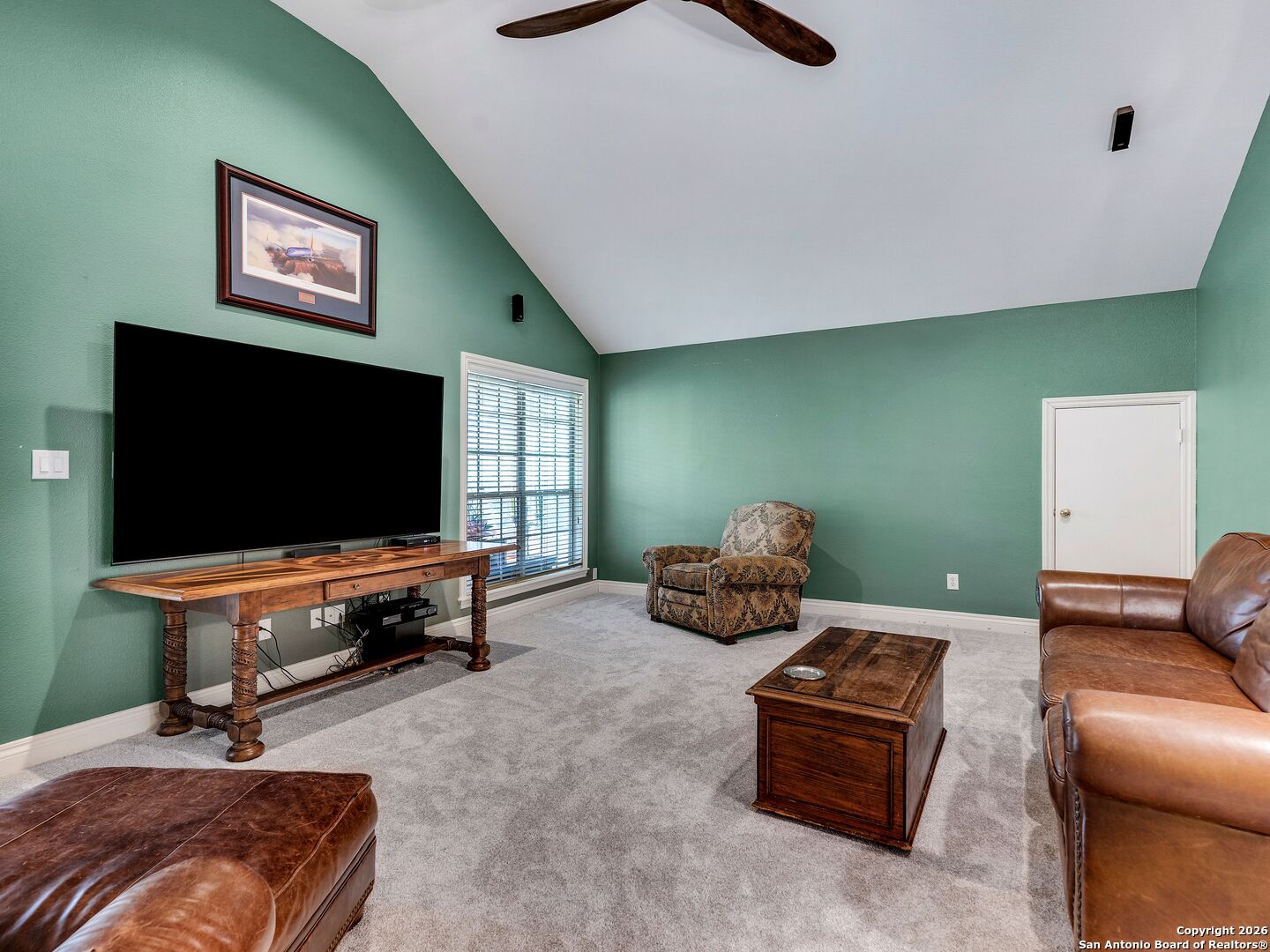 155 Cibolo Ridge Trail Boerne, TX 78015 - Photo 45 of 100 a living room with furniture and a flat screen tv