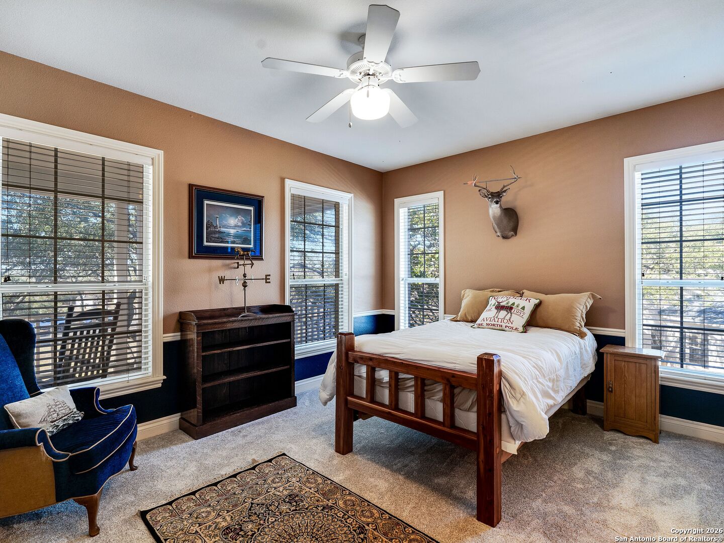 155 Cibolo Ridge Trail Boerne, TX 78015 - Photo 49 of 100 a bedroom with a bed furniture and a window