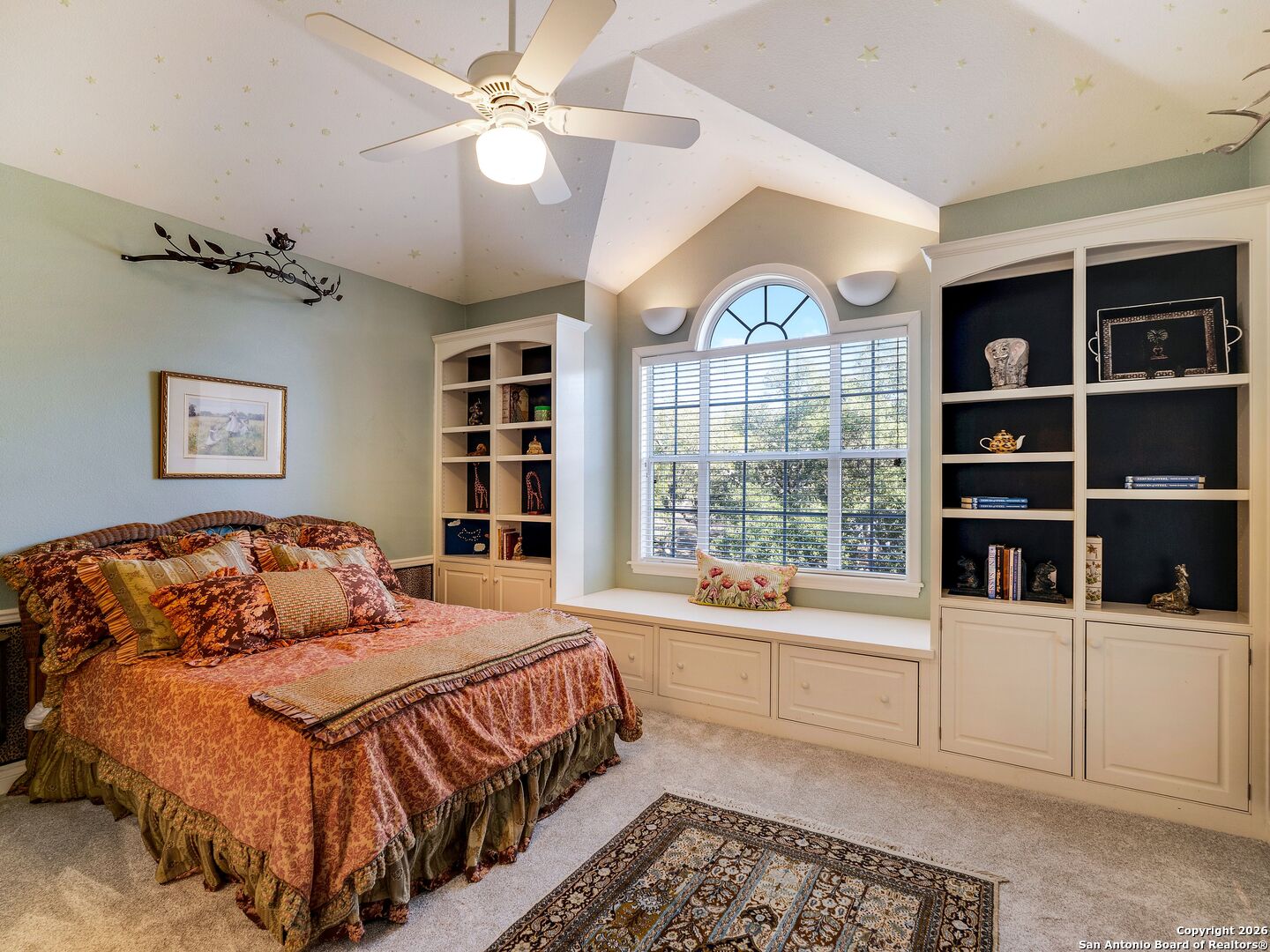 155 Cibolo Ridge Trail Boerne, TX 78015 - Photo 55 of 100 a bedroom with a large bed and a window